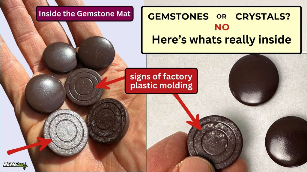 Inside view of a PEMF gemstone wellness mat showing plastic discs instead of real crystals