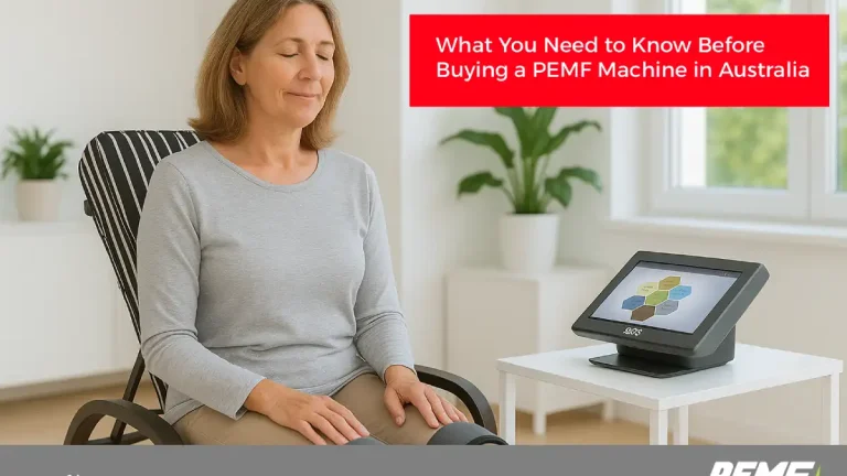 PEMF therapy machine with a touchscreen interface, placed on a white table in a modern wellness clinic